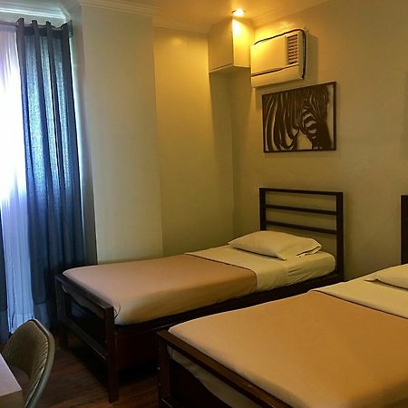 Hotel Tiffany Laoag Bagian luar foto